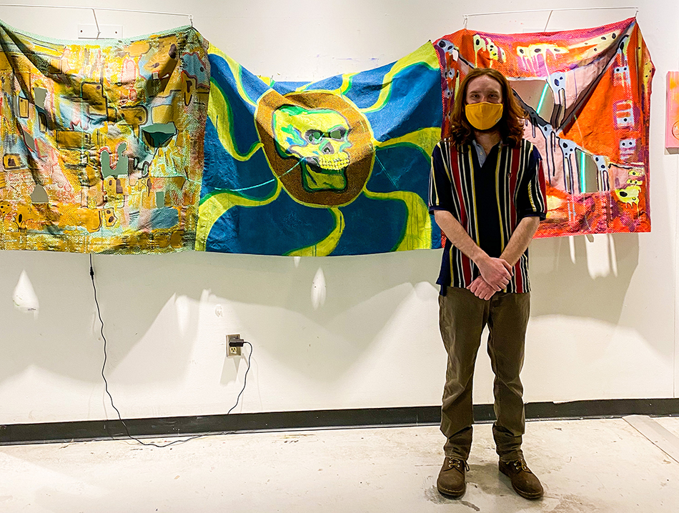 Steven Gavel poses with his work, Afterlife