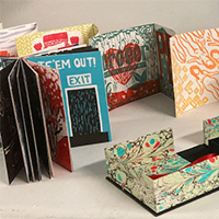 Display of decorative paper from book arts classes taught by Kathleen O’Connell.