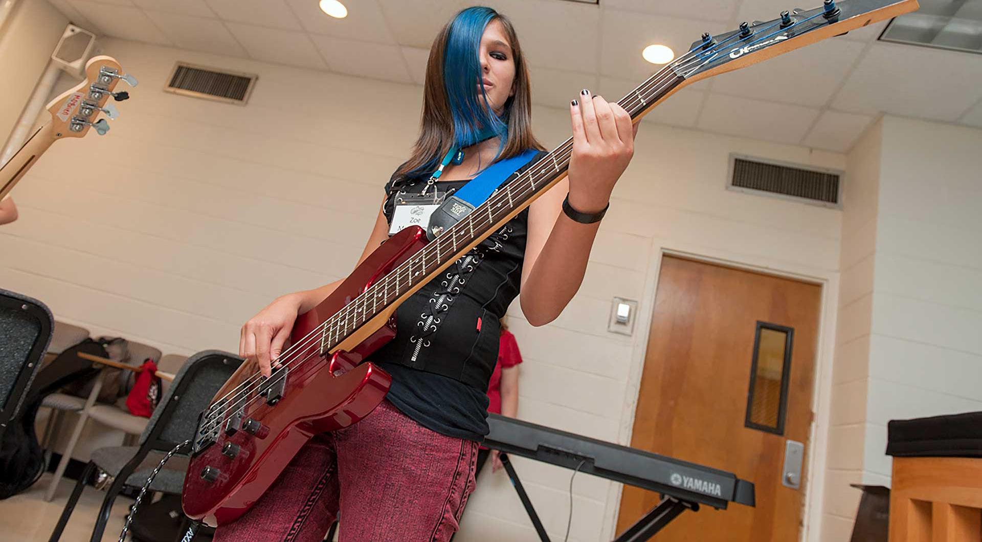 Girl playing guitar