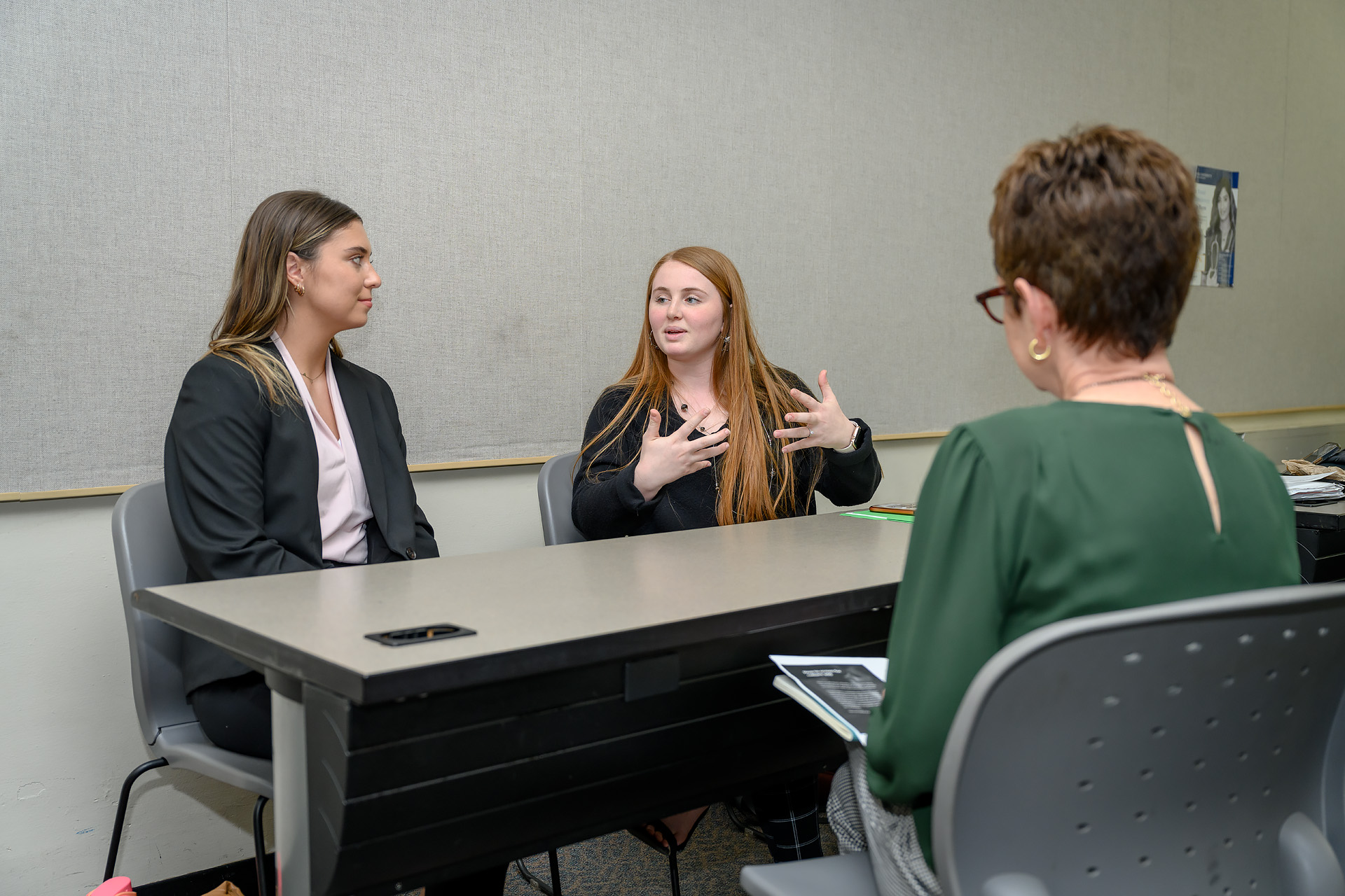 Students participate in Mock Interviews to help with career success.