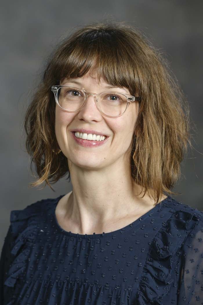 Dr. J. Claire Cook