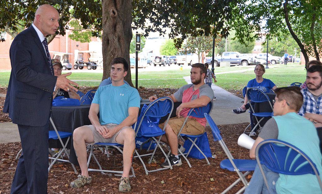 Huber speaking at Newcomers Briefing