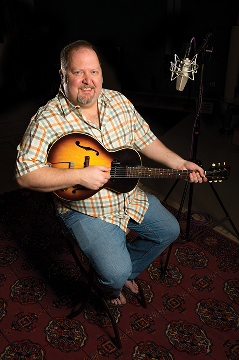 Odie Blackmon, songwriting faculty in the Recording Industry program, in RIM Studio A and in his Ezell Hall classroom.