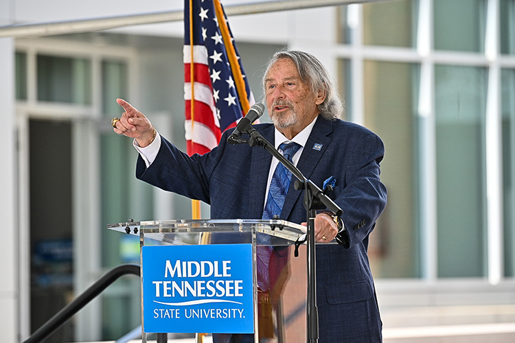 Harold "Terry" Whiteside, dean of the MTSU College of Behavioral and Health Sciences, speaks at the Aug. 18 ribbon-cutting for the new Academic Classroom Building that will house the disciplines of criminal justice, psychology and social work. (MTSU photo by J. Intintoli)