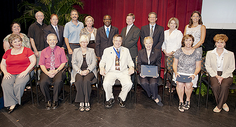 MTSU faculty and leaders celebrate the latest MTSU Foundation Awards at the 2011 Fall Faculty Meeting Aug. 26. Seated, from left, are Drs. Alyson Bass, Vince Smith and Virginia Donnell; Honors College Dean John Vile; Drs. Meredith Higgs, Melissa Wald and Rebecca Foote. Standing, from left, are Drs. Shannon Hodge and Ron Aday; University Provost Brad Bartel; Dr. Tim Graeff; MTSU Foundation President Murray Martin and MTSU President McPhee; Dr. Scott Handy; Professor Don Aliquo; Drs. Cindi Smith-Walters and Heather Brown. Not pictured are Drs. Bruce Cahoon, Daniel Prather and John Sanborn. (MTSU photo by Andy Heidt)