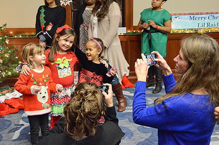 A group of Little Raiders pose for a photo during the annual Little Raiders Christmas Party held Dec. 11 at MTSU. The event benefits area families needing a helping hand at Christmas, including families from the local domestic violence program. (MTSU photo by Jimmy Hart)