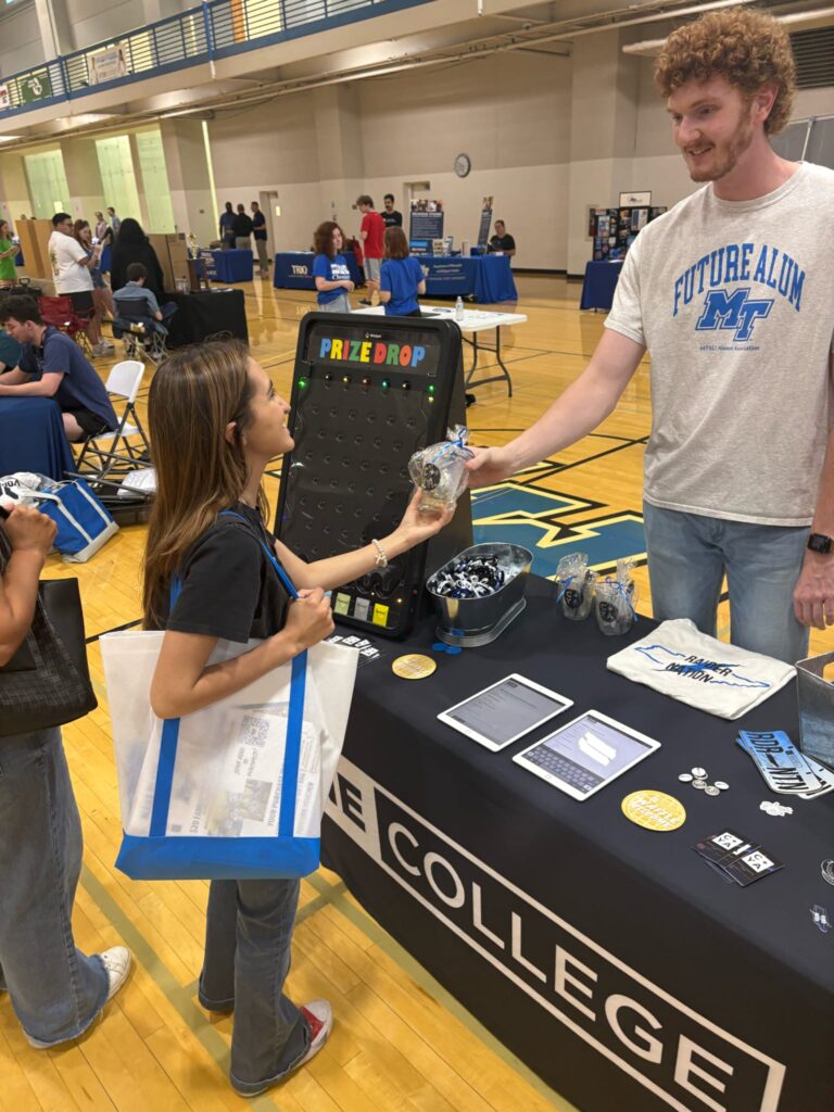 student photo at a tabling event in our rec center