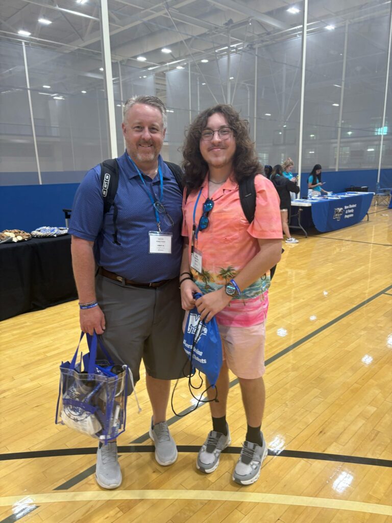 student and parent photo at the rec center