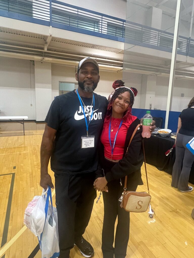 student and parent posing for a photo