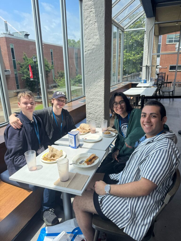 group of students eating in a dining hall