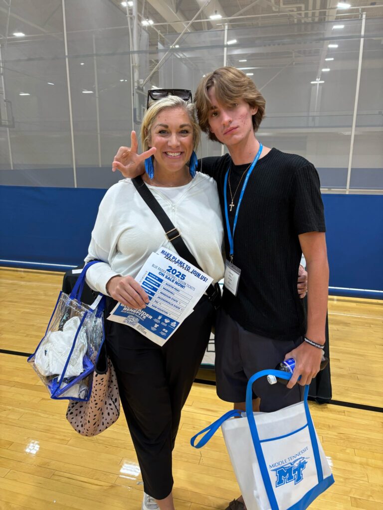 student and parent posing for a photo