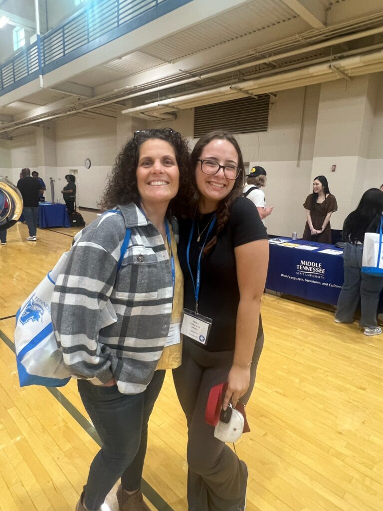 student and parent posing for a photo