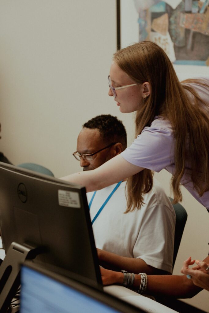 Student using a computer with a Student Orientation Assistant.