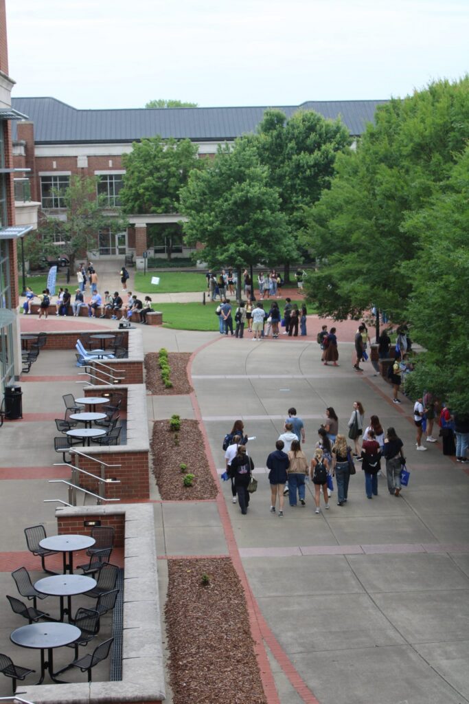An ariel photo of student attending orientation with their Student Orientation Assistant.