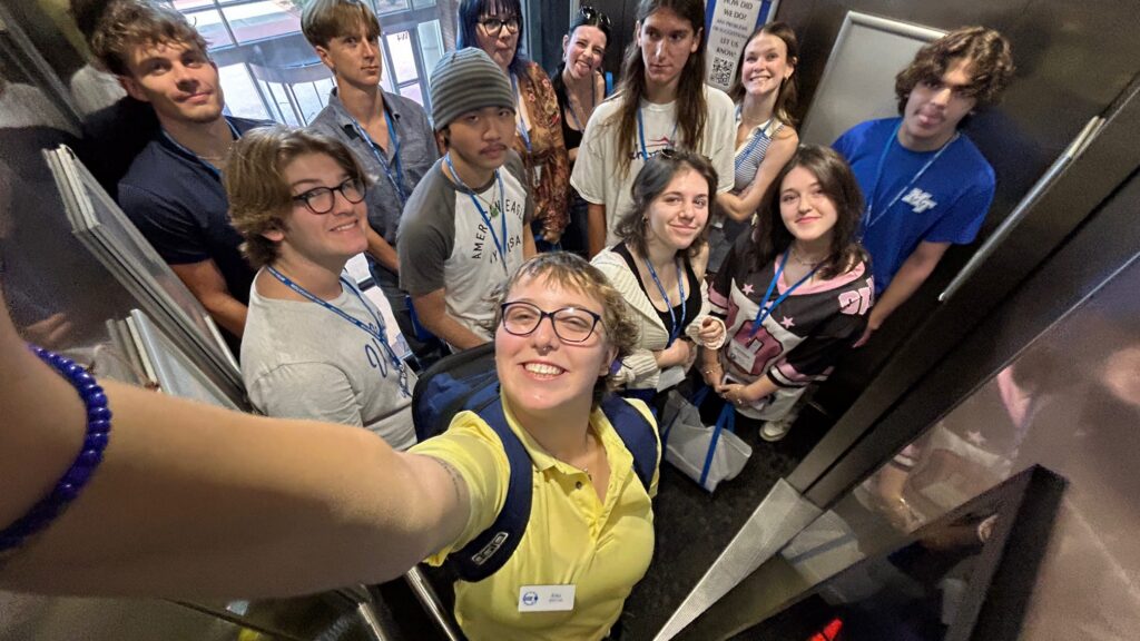 Students attending New to Blue Orientation posing for a photo with their Student Orientation Assistant.