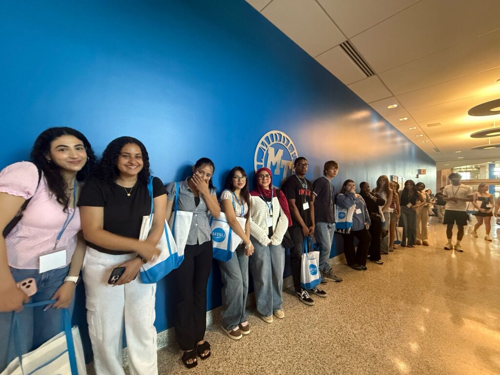 Students attending New to Blue Orientation standing inside the Student Union.