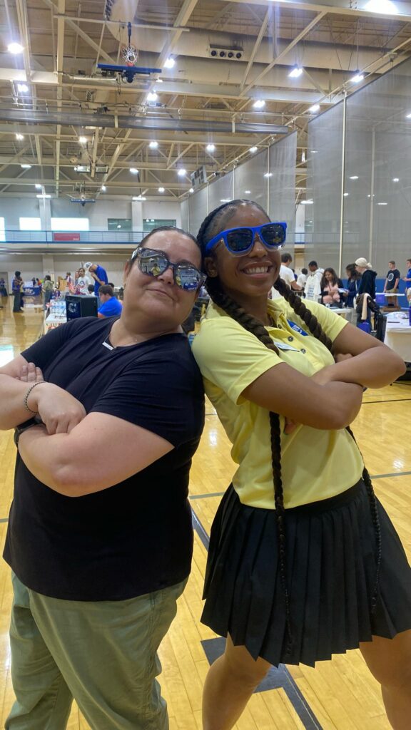 Student/guest attending New to Blue Orientation posing for a photo with their Student Orientation Assistant.