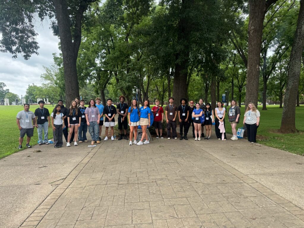 Students attending New to Blue Orientation posing for a photo with their Student Orientation Assistants.