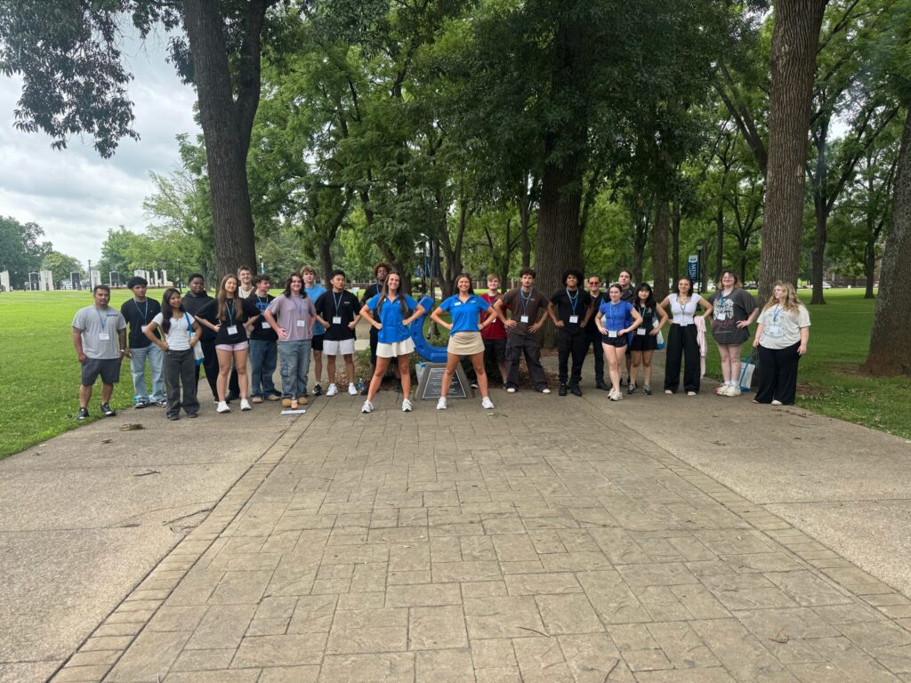 Students attending New to Blue Orientation posing for a photo with their Student Orientation Assistants.