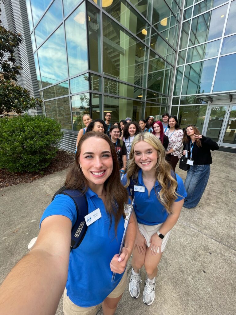 Students attending New to Blue Orientation posing for a photo with their Student Orientation Assistants.