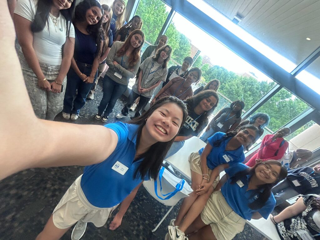 Students attending New to Blue Orientation posing for a photo with their Student Orientation Assistants.