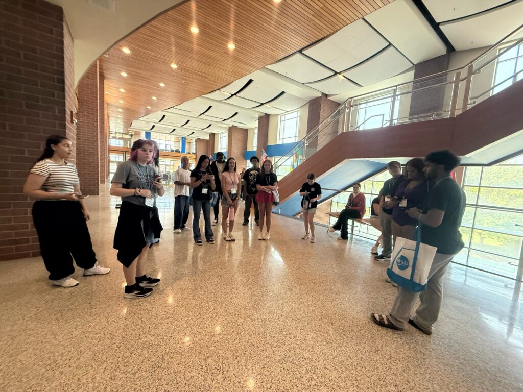 Students attending New to Blue Orientation standing in the Student Union.