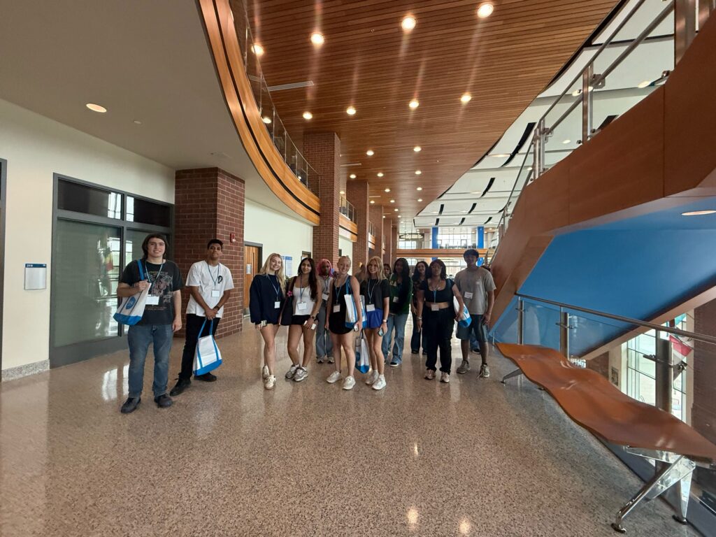 Students attending orientation standing in the Student Union