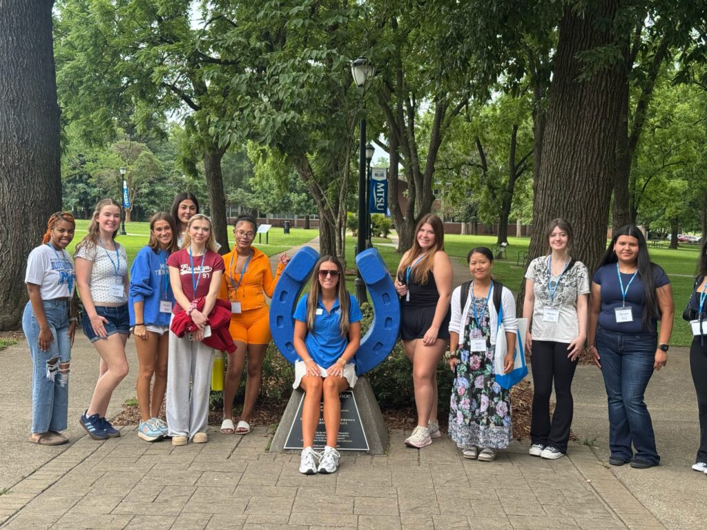 Students attending New to Blue Orientation posing for a photo with their Student Orientation Assistants.