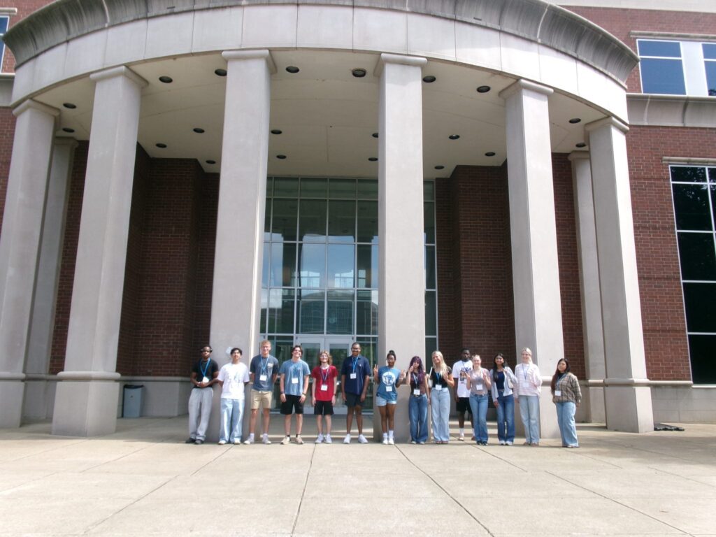 Students attending orientation standing outside the Business and Aerospace Building.