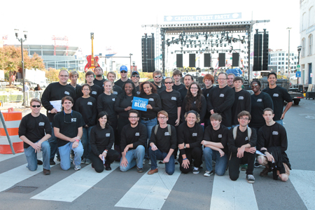 Professor Bob Gordon, shown standing fourth from right in the second row, and his student team from MTSU’s Department of Electronic Media Communication pause early Oct. 17 in their prep for the 2012 Capitol Street Party in Nashville featuring headliner Luke Bryan. The College of Mass Communication’s Mobile Production Truck was located at the corner of Second Avenue and Broadway. (MTSU file photo)