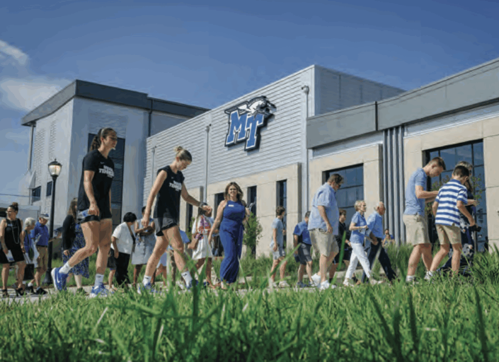 Students outside the Stephen and Denise Smith Student-Athlete Performance Center