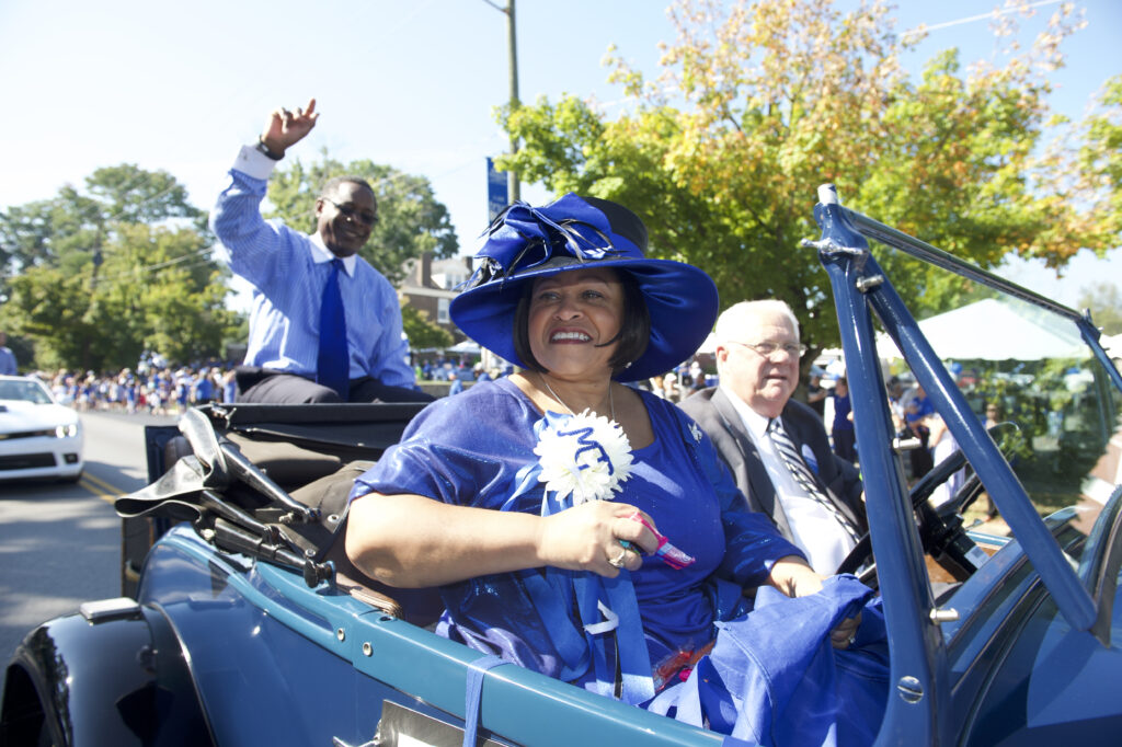 Elizabeth McPhee, former First Lady of Middle Tennessee State University, riding in a car during a Homecoming parade
