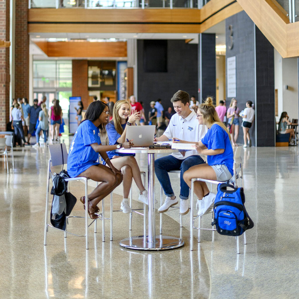 Students sitting at table