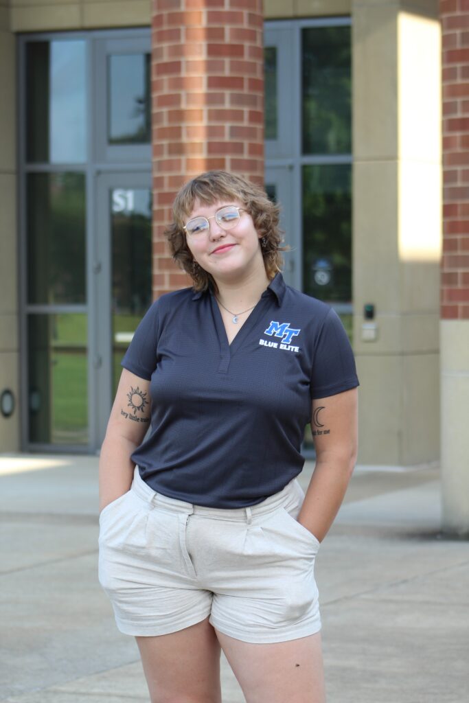 Headshot of Blue Elite, Erika Hill