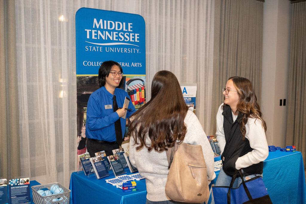 Prospective students speaking with an MTSU representative.