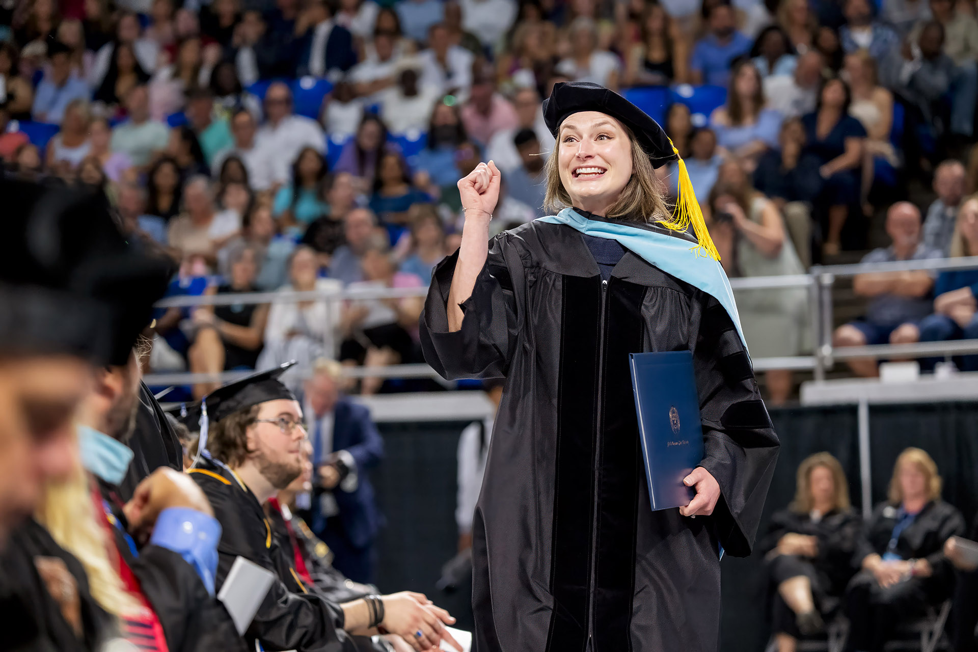 Trisha Thompson Murphy in doctoral regalia in Murphy Center.