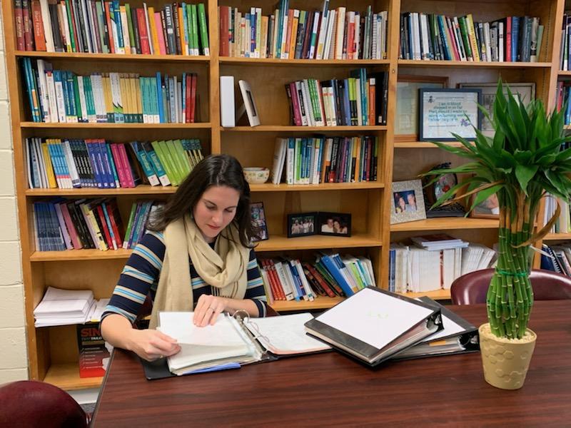 Faculty and Graduate Students Work with Archival Documents