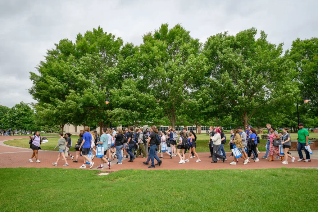 Tour group walking on MTSU's campus